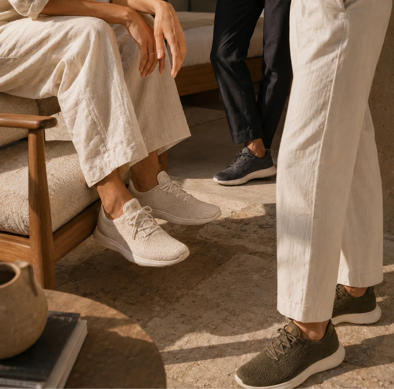 Allbirds — Three colorways worn in a sunlit travertine lounge