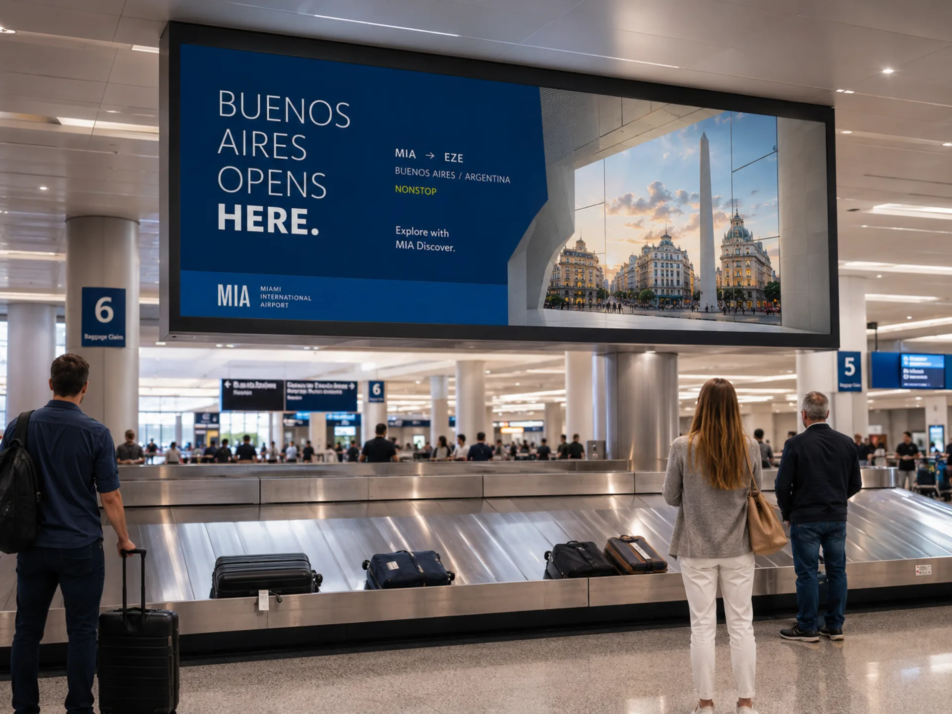 Opens Here — Buenos Aires Opens Here banner above the baggage claim hall