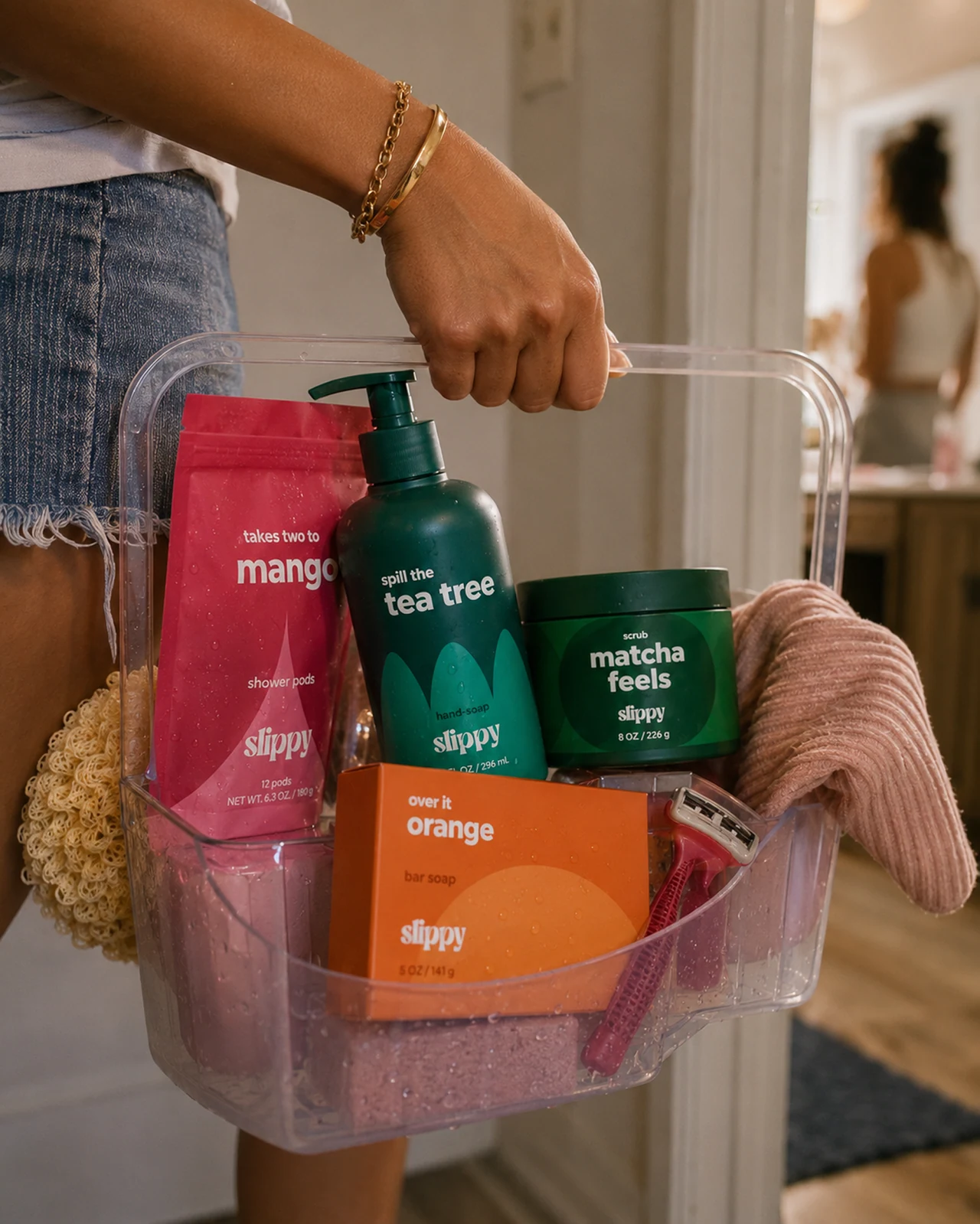 Slippy — Bathroom caddy packed with Slippy shower pods, hand soap, scrub, and bar soap as part of an everyday shower routine
